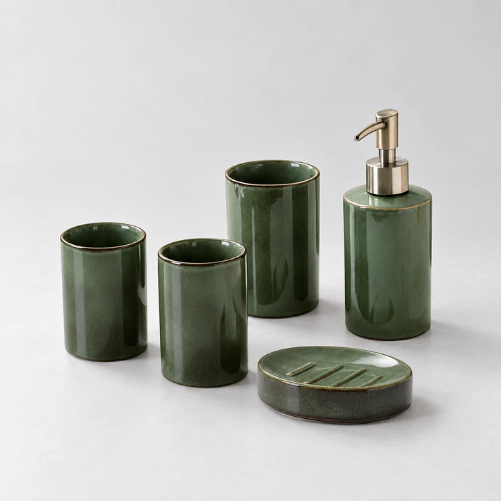 Forest-green five-piece bathroom set with two cups, holder, pump dispenser and soap dish.