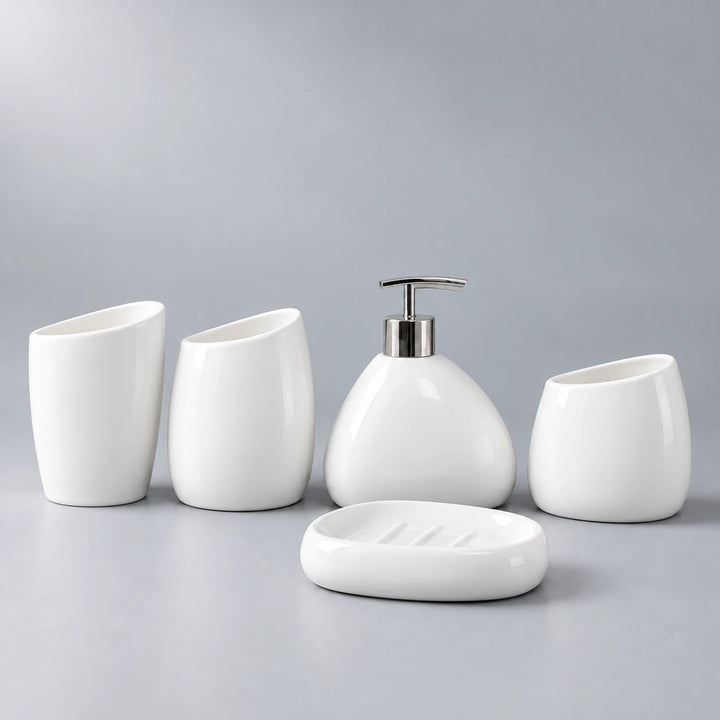 Arc White five-piece ceramic bathroom set with two cups, holder, pump dispenser and soap dish.