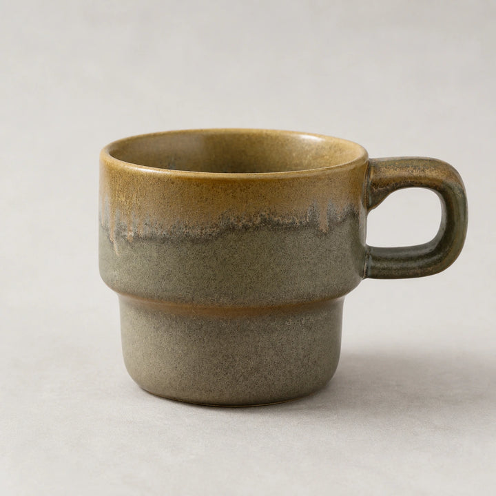 Verdant Ridge layered-glaze ceramic mug on a light pearl-gray background.