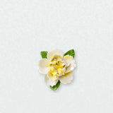 Small Ruffled Peony Ceramic Wall Flower in Golden Yellow Accent on a pale neutral studio wall.