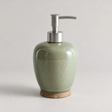 Willow Sage ceramic soap dispenser with green crackle glaze, a silver-tone pump and a brown base.