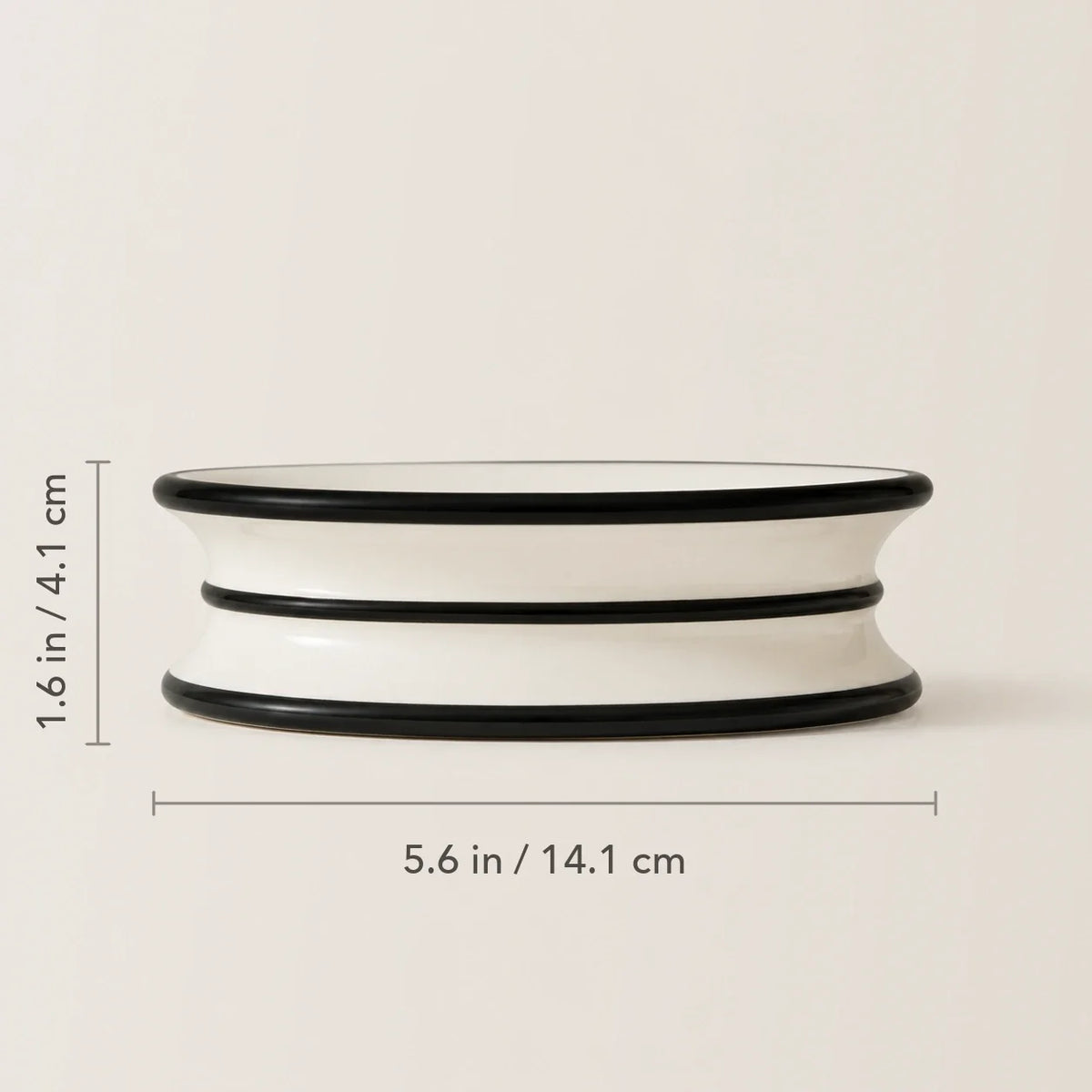 Side view showing soap dish dimensions of 5.6 by 1.6 inches