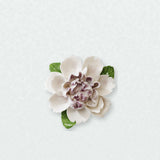 Medium Ruffled Peony Ceramic Wall Flower in Plum Purple Accent on a pale neutral studio wall.