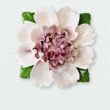 Extra Large Ruffled Peony Ceramic Wall Flower in Plum Purple Accent on a pale neutral studio wall.