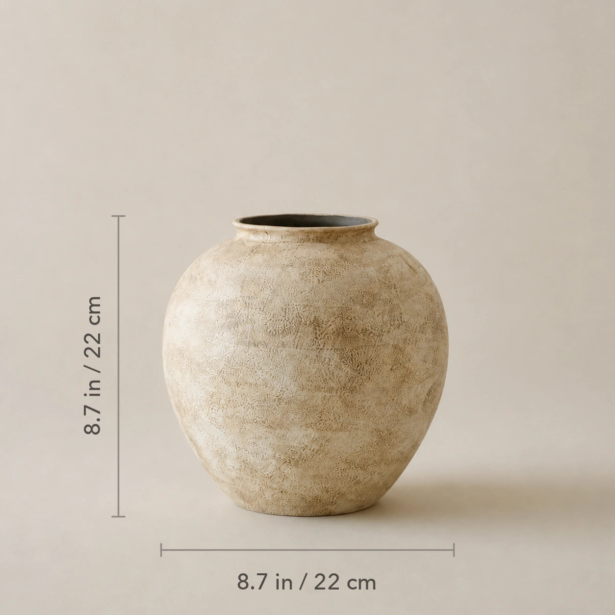 Small stone-textured ceramic vase shown as 8.7 in wide and 8.7 in high.