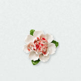 Medium Ruffled Peony Ceramic Wall Flower in Rose Red Accent on a pale neutral studio wall.