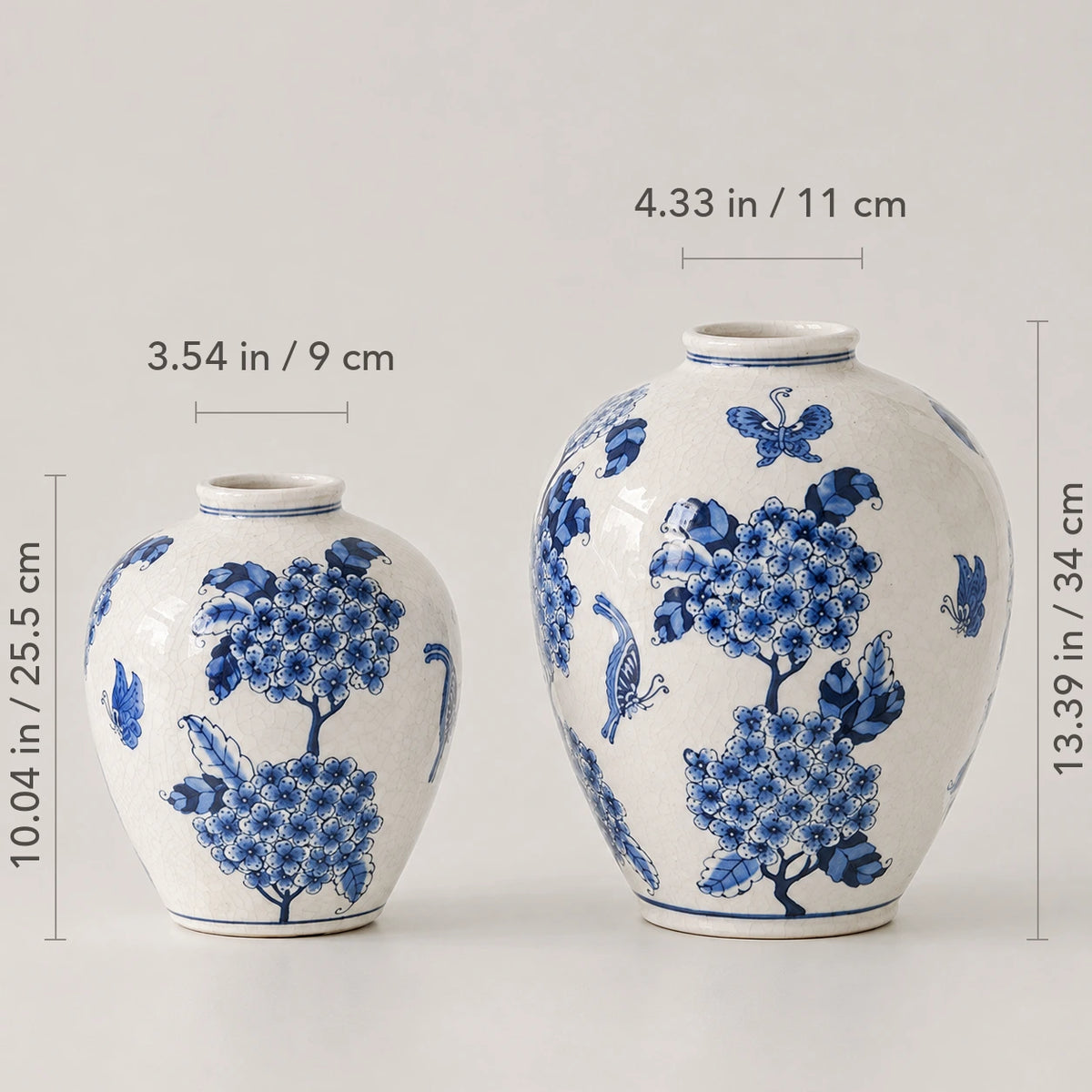 Two-vase size guide: Small 25.5 cm tall with a 9 cm outer rim; Large 34 cm tall with an 11 cm outer rim.