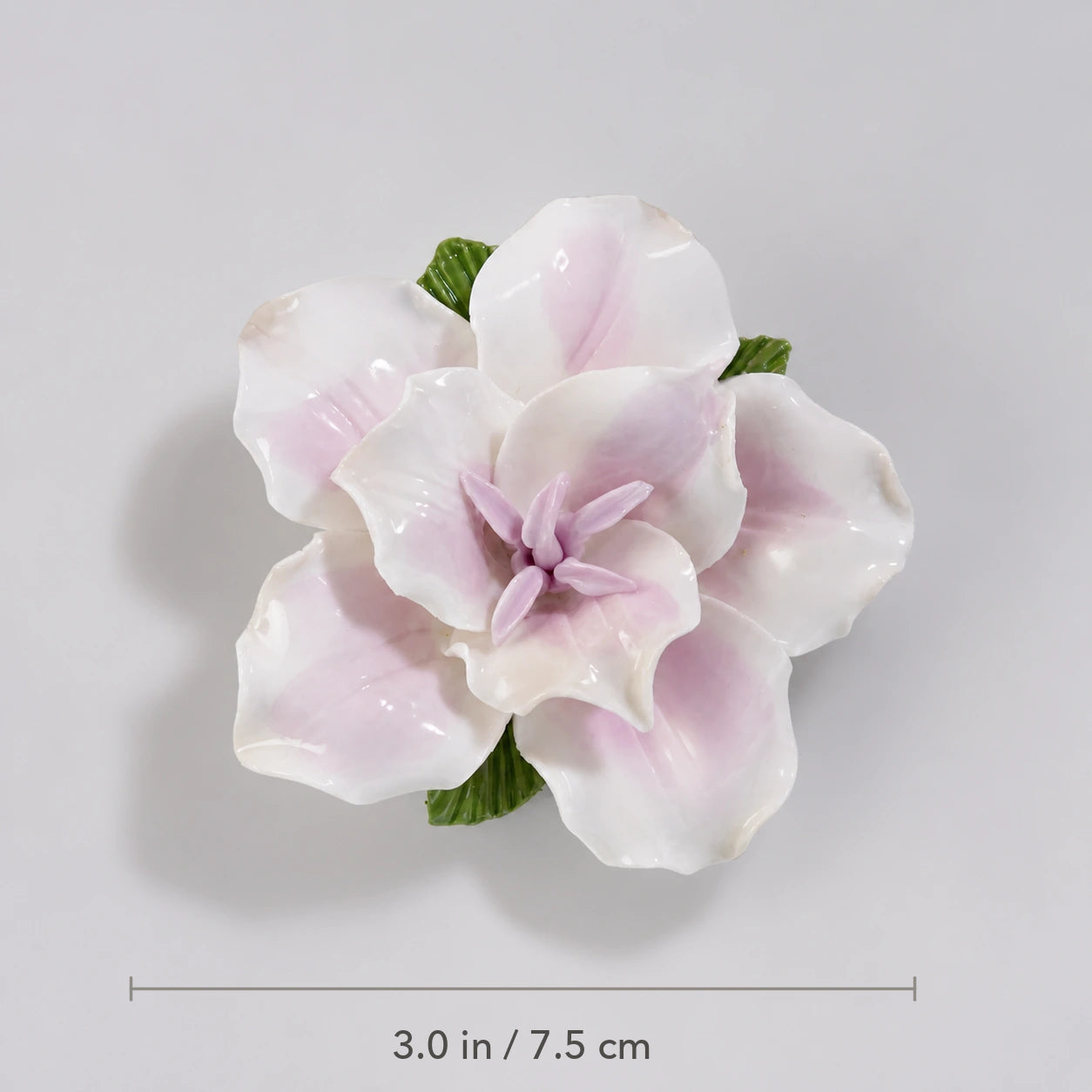 Soft lavender ceramic lily magnet with diameter marked as 3.0 inches or 7.5 centimeters.