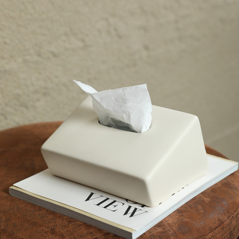 White tissue box on a magazine with a blurred background