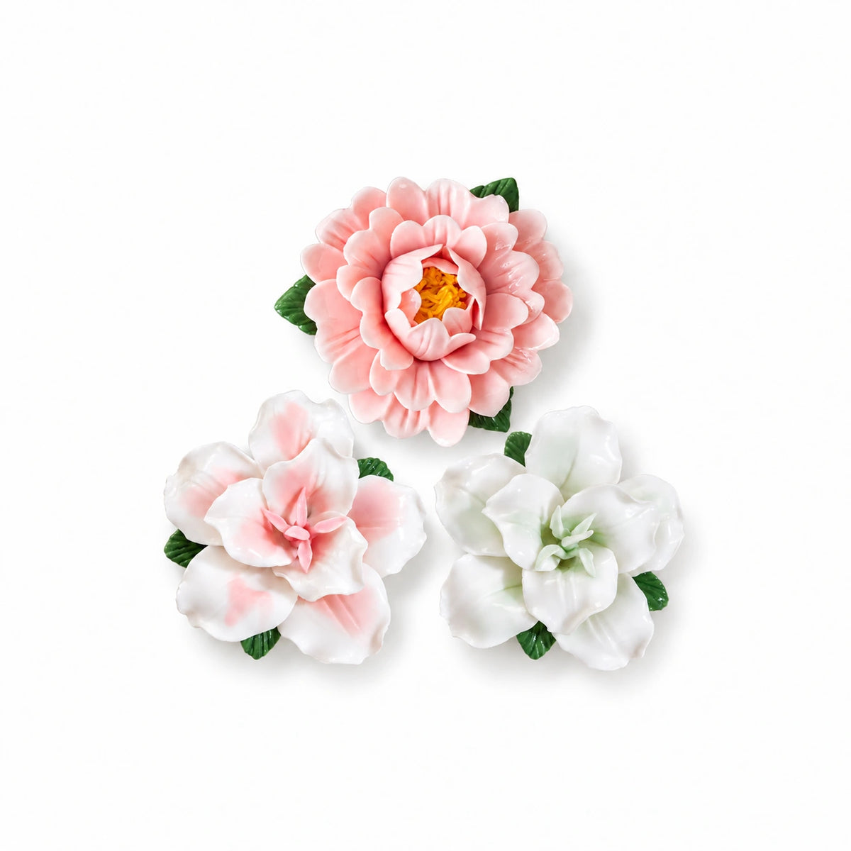 Blush Garden set of three ceramic fridge magnets: one pink peony, one pink lily and one pale-green lily on white.