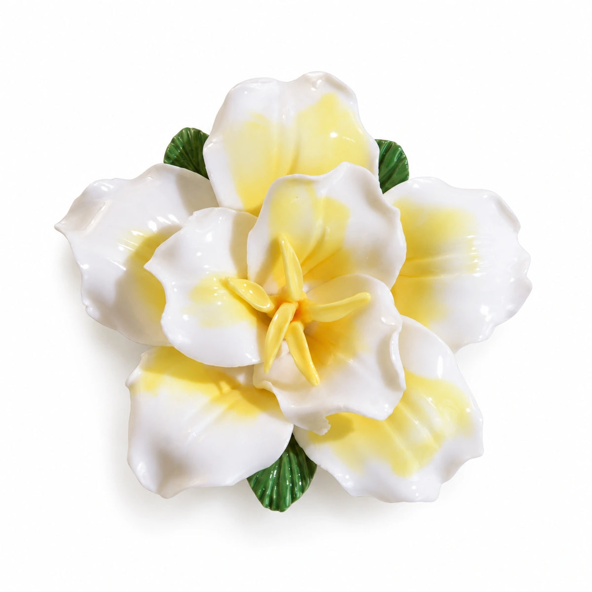 Butter Yellow ceramic lily fridge magnet with green leaves on a white background.