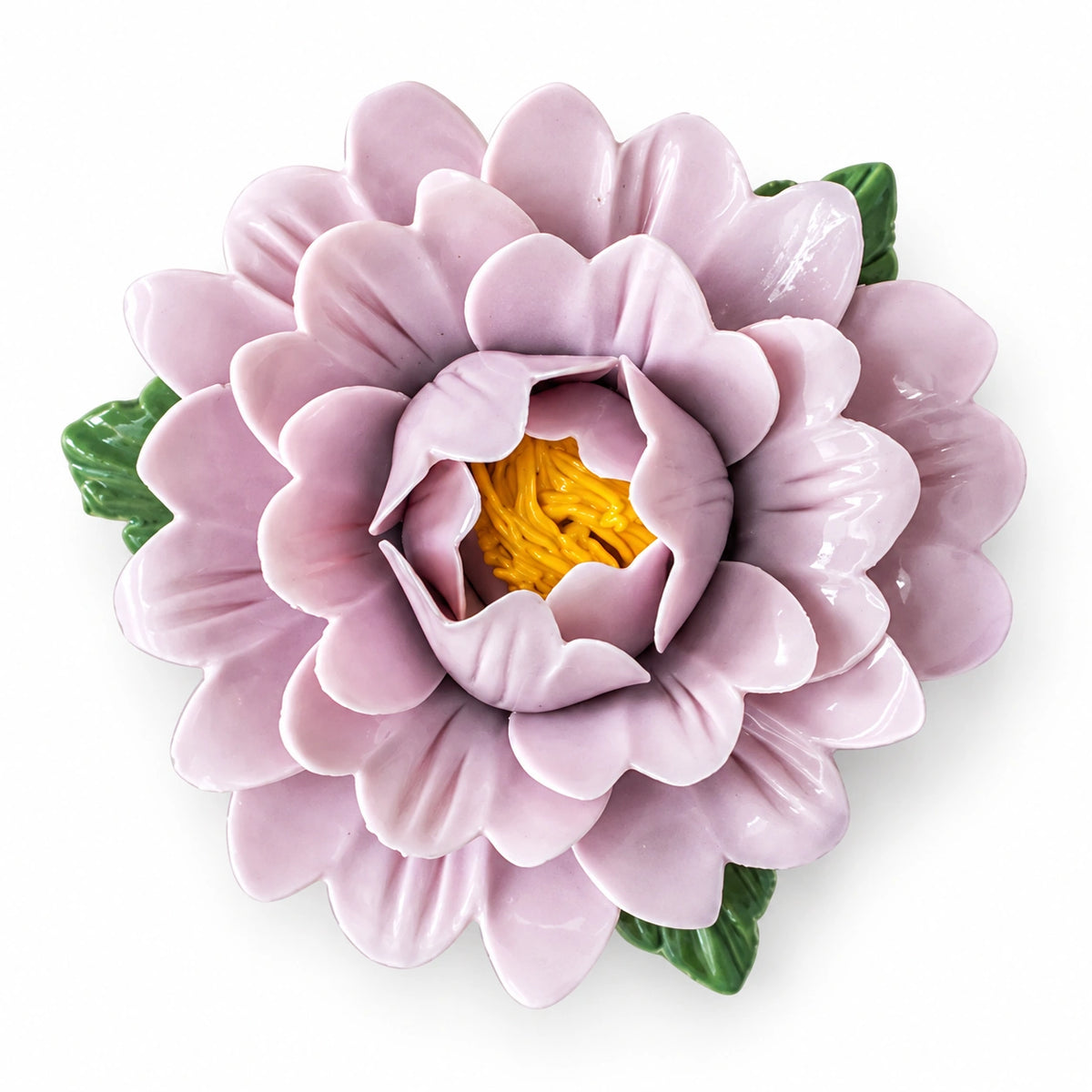 Lavender ceramic peony fridge magnet with green leaves on a white background.