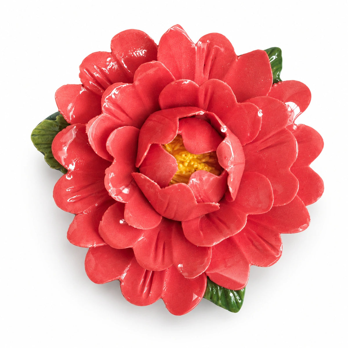 Rose Red ceramic peony fridge magnet with green leaves on a white background.