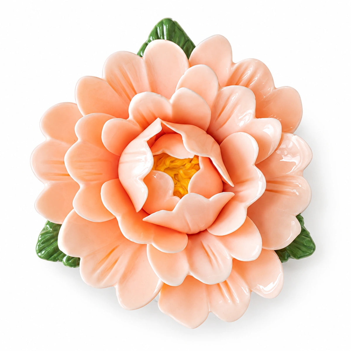 Soft Apricot ceramic peony fridge magnet with green leaves on a white background.
