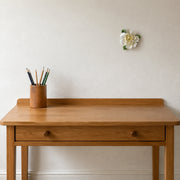 12 cm Large Ruffled Peony ceramic wall flower with golden yellow accent styled in a warm neutral interior.