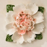 Front view of the Extra Large Ruffled Peony ceramic wall flower with rose red accent.