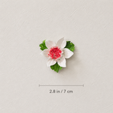 Dimension image for the Small Lotus Bloom ceramic wall flower with rose red accent, showing a 2.8 in / 7 cm diameter.