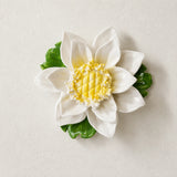Front view of the Medium Lotus Bloom ceramic wall flower with golden yellow accent.