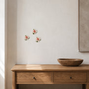 7 cm Small Ruffled Peony ceramic wall flower with rose red accent styled in a warm neutral interior.