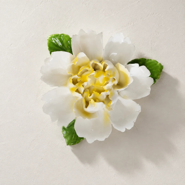 Front view of the Large Ruffled Peony ceramic wall flower with golden yellow accent.