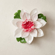Front view of the Medium Lotus Bloom ceramic wall flower with rose red accent.