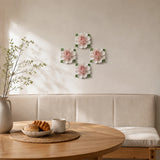 Multiple 15 cm Extra Large Ruffled Peony ceramic wall flowers with rose red accent arranged as a wall grouping in a warm neutral interior.