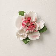 Front view of the Small Ruffled Peony ceramic wall flower with rose red accent.
