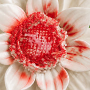 Close frontal view of the rose red center and layered glazed petals of the Large Lotus Bloom ceramic wall flower.