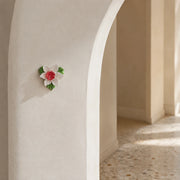 7 cm Small Lotus Bloom ceramic wall flower with rose red accent styled in a warm neutral interior.