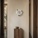 12 cm Large Lotus Bloom ceramic wall flower with plum purple accent styled in a warm neutral interior.