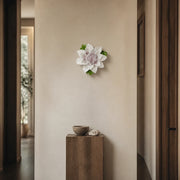 12 cm Large Lotus Bloom ceramic wall flower with plum purple accent styled in a warm neutral interior.