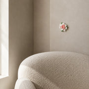 9 cm Medium Ruffled Peony ceramic wall flower with rose red accent styled in a warm neutral interior.