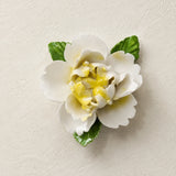 Front view of the Small Ruffled Peony ceramic wall flower with golden yellow accent.