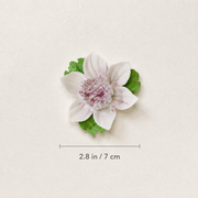 Dimension image for the Small Lotus Bloom ceramic wall flower with plum purple accent, showing a 2.8 in / 7 cm diameter.