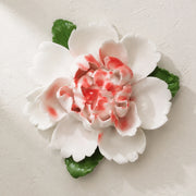 Front view of the Medium Ruffled Peony ceramic wall flower with rose red accent.