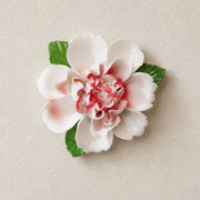 Front view of the Large Ruffled Peony ceramic wall flower with rose red accent.