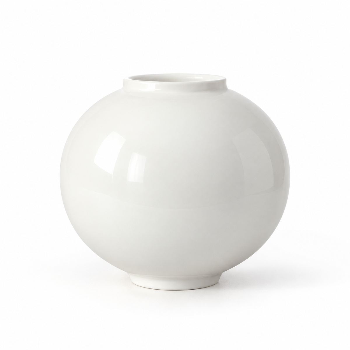 Medium glossy white moon ceramic vase on a white studio background.