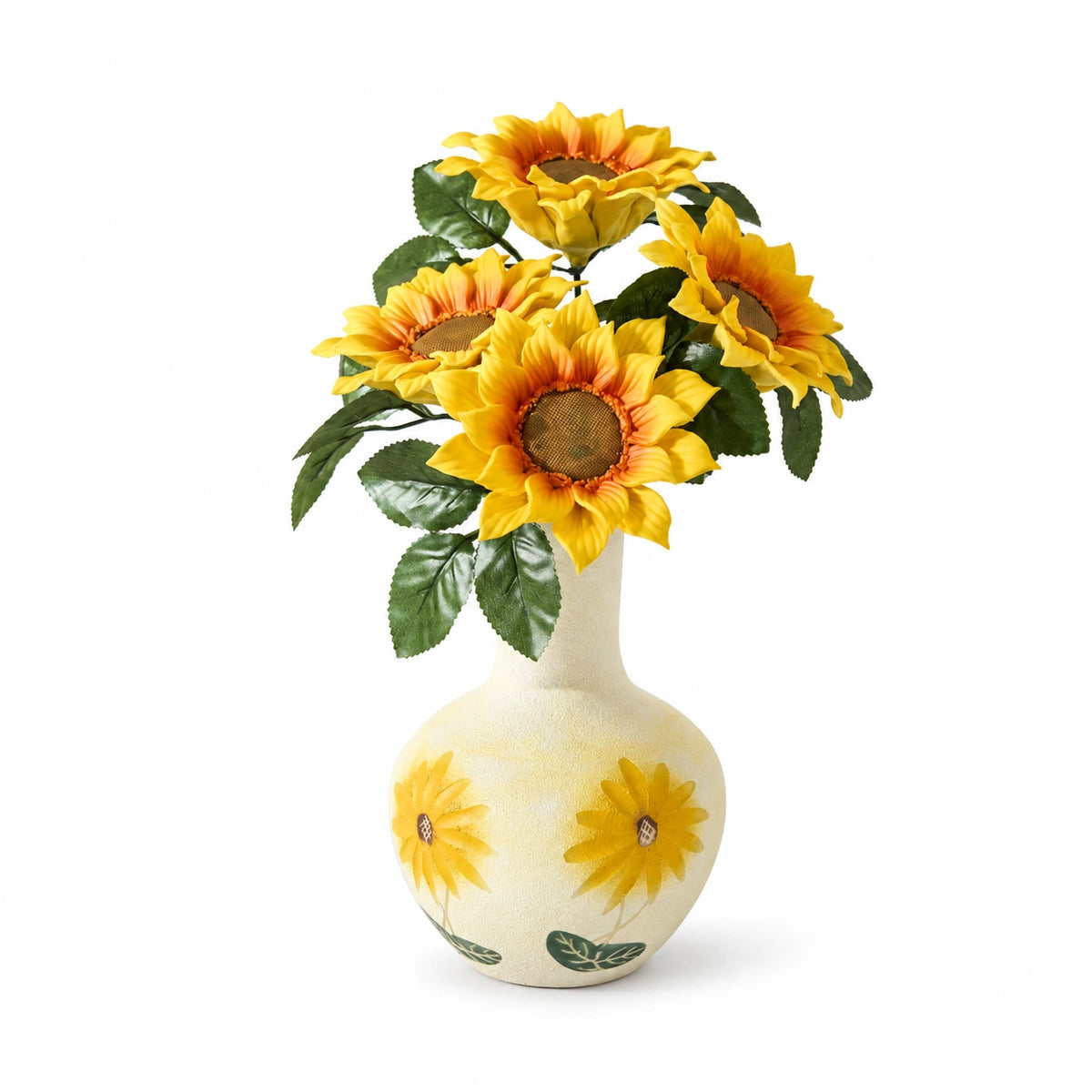 Four yellow porcelain sunflowers in a cream vase with sunflower motifs on a white background.