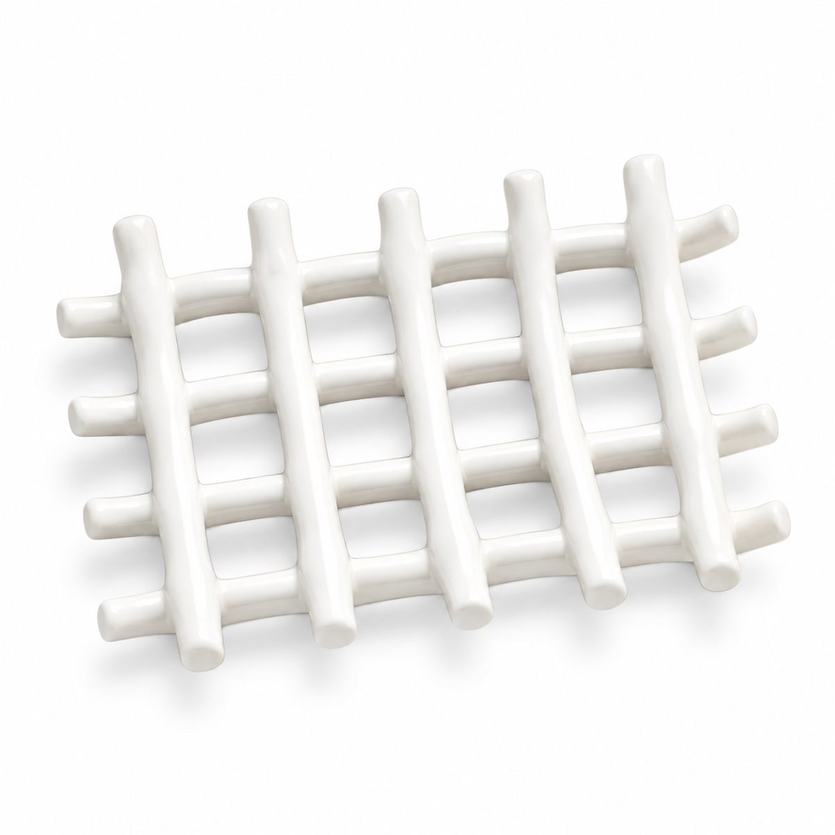 White ceramic soap dish formed from intersecting branch-like rods.