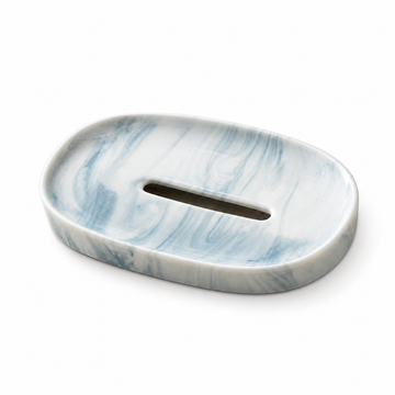 Blue and white marbled oval ceramic soap dish with a long central drainage slot.