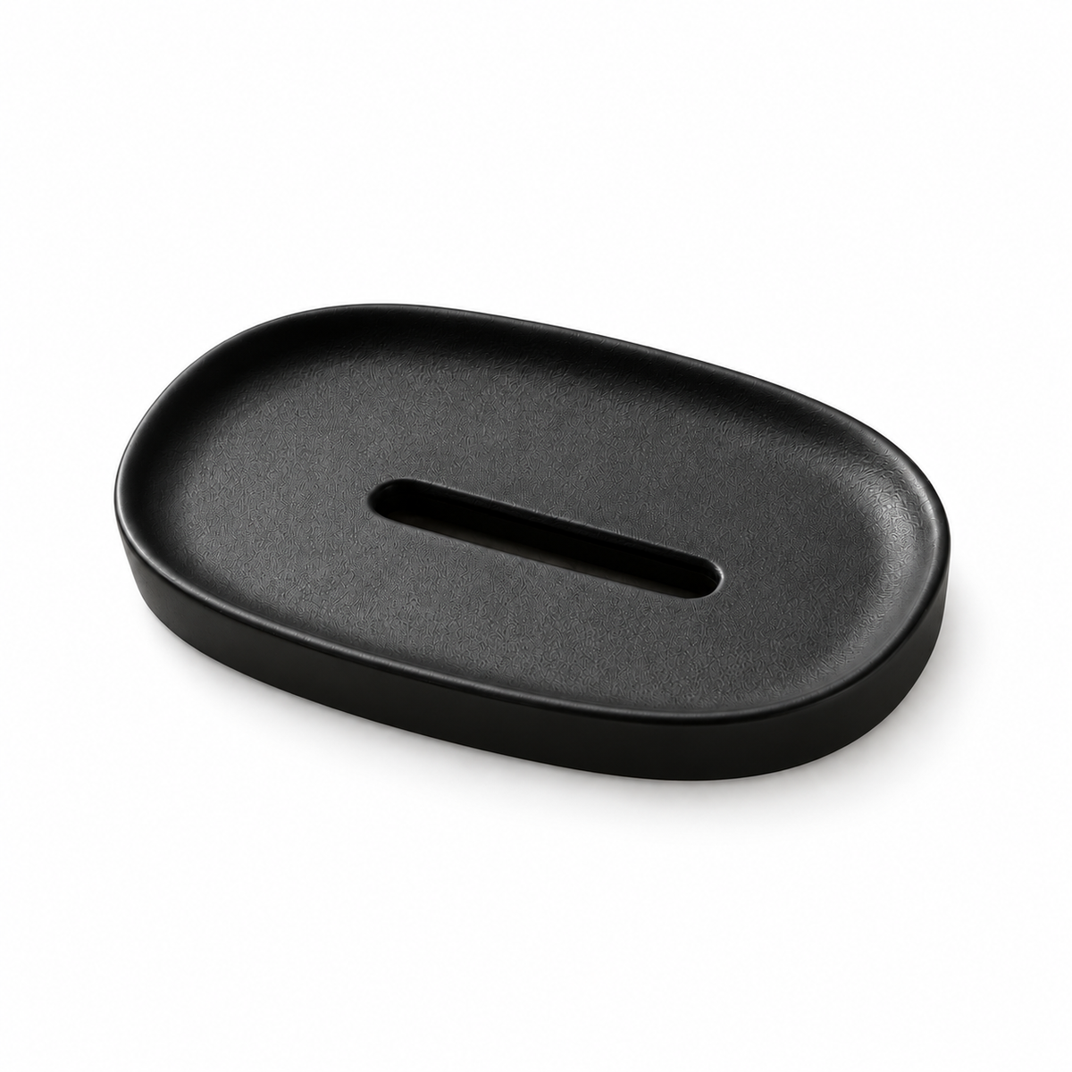 Textured matte black oval ceramic soap dish with a long central drainage slot.