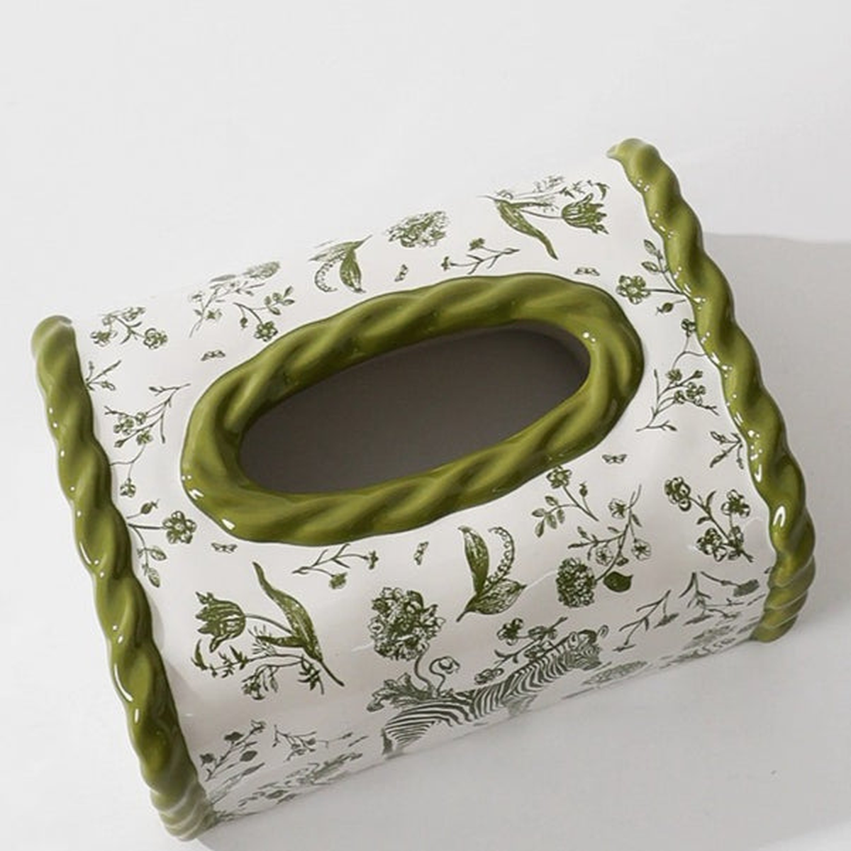 Original moss green ceramic cover photo showing the olive twisted oval opening and botanical print.