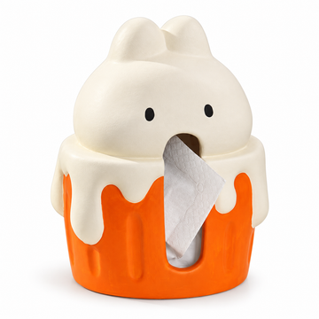Cache-boîte à mouchoirs en céramique en forme de lapin crème sur un cupcake orange, avec ouverture à l’avant