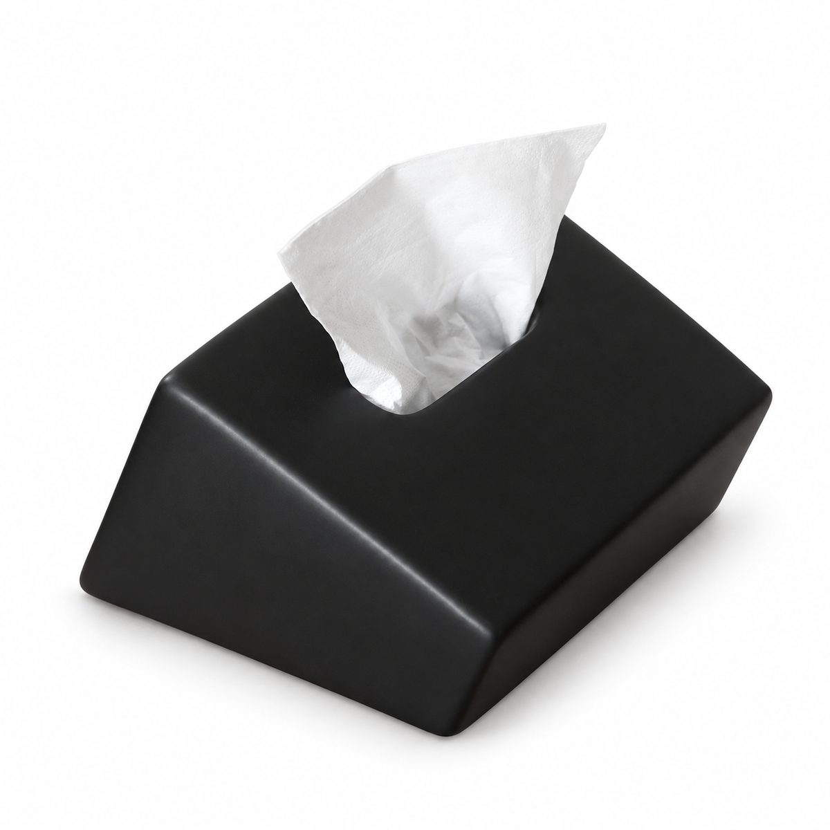 Black sloped ceramic tissue box cover with a wedge-shaped top and one tissue opening