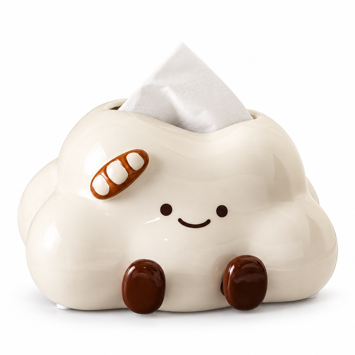 Cream cloud-shaped ceramic tissue box cover with two brown feet and a small baguette ornament.
