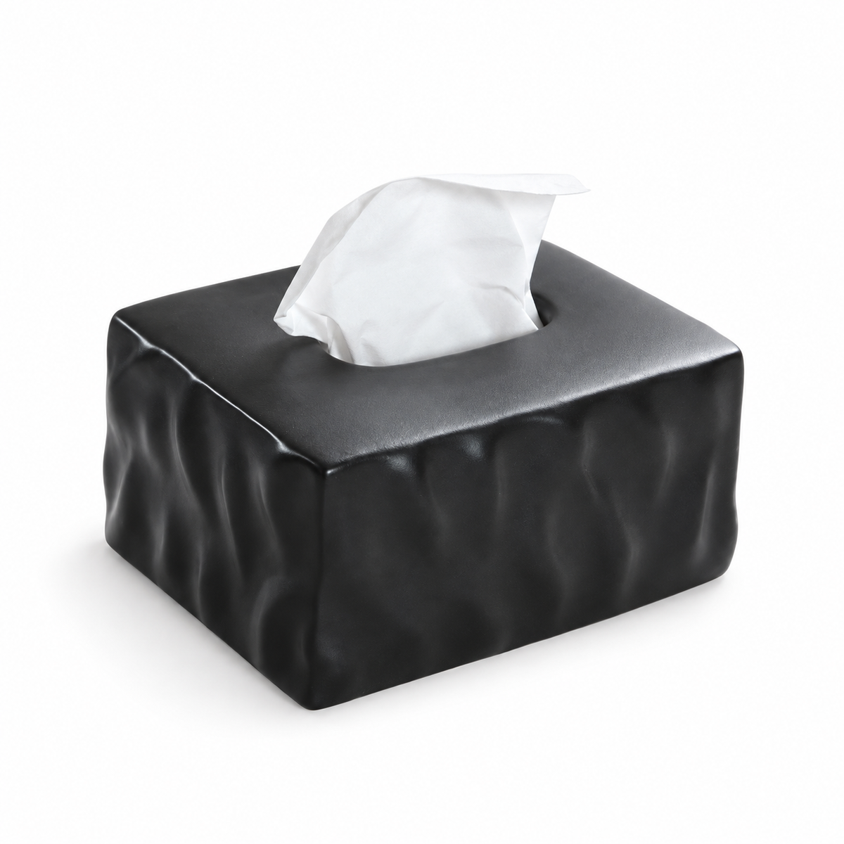 Matte Noir wavy ceramic tissue box cover with irregular folded sides on a white background.