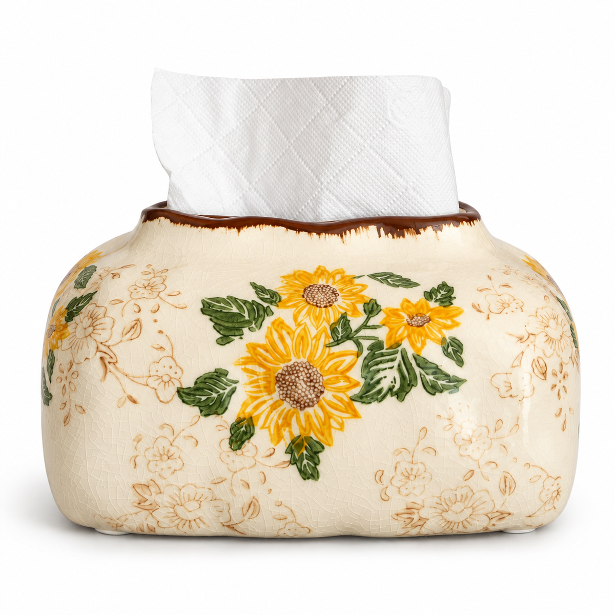 Cream ceramic tissue box cover with yellow sunflowers, green leaves, a brown top rim and a white tissue.