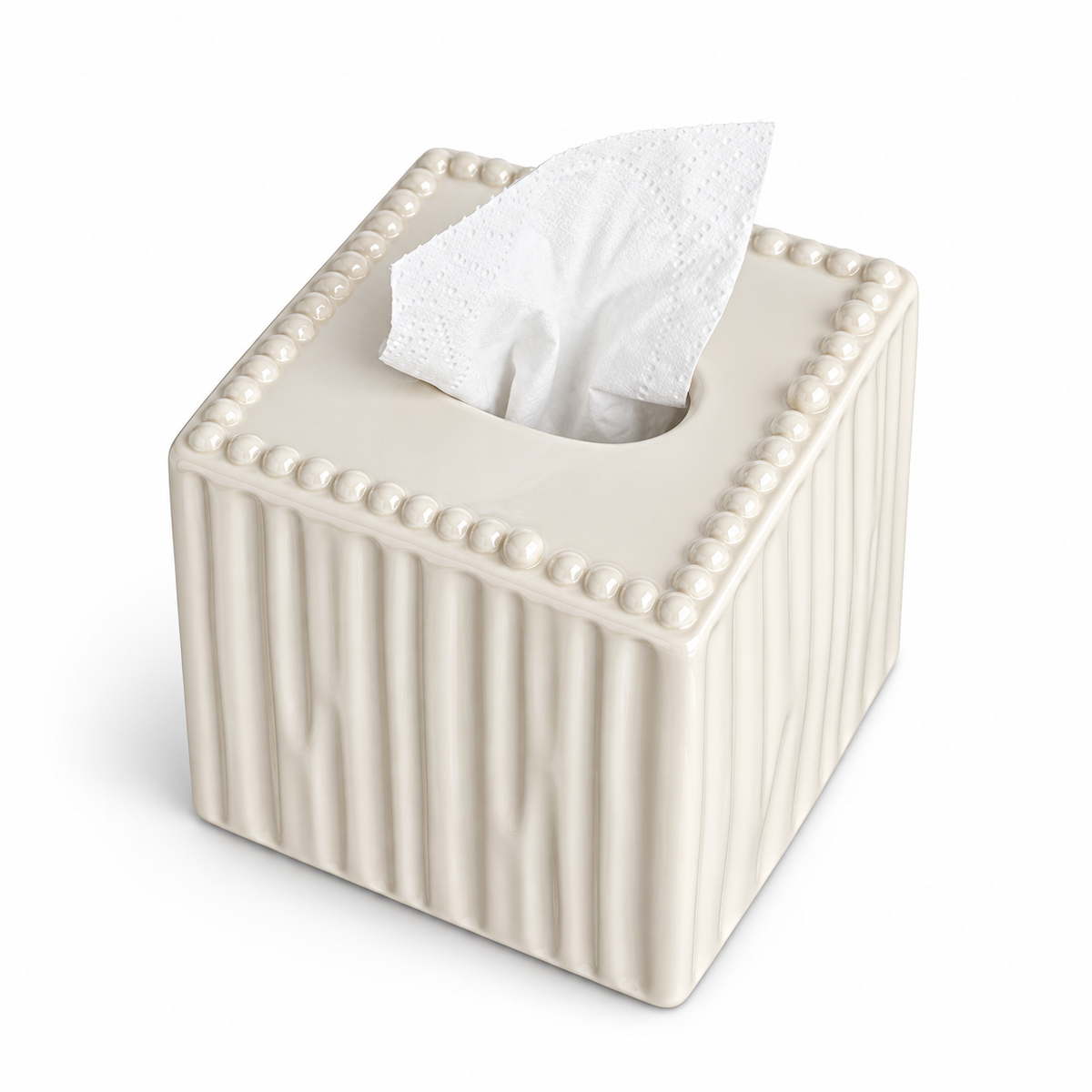Tall square cream ceramic tissue cover with vertical flutes and a pearl rim on a white background.
