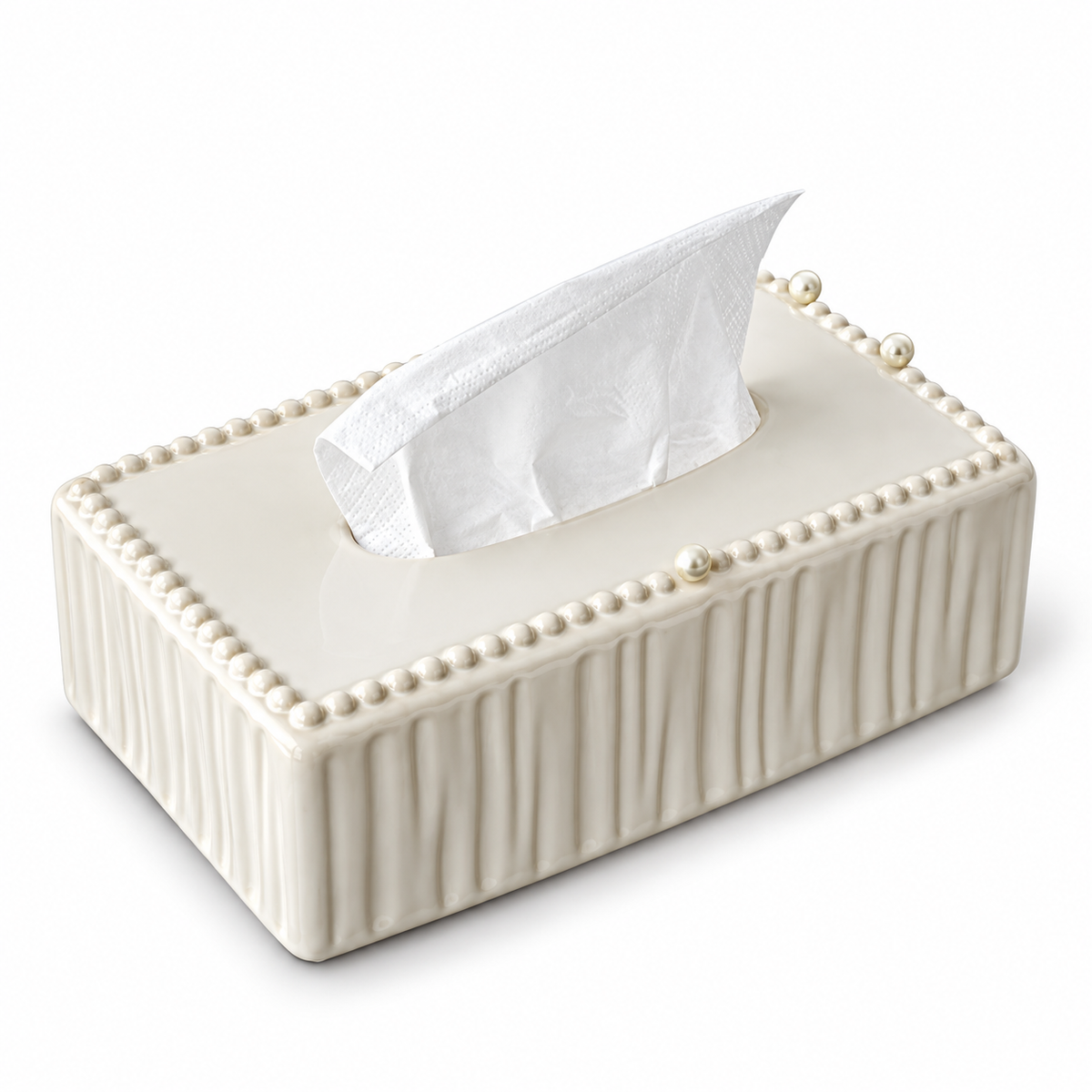 Low rectangular cream ceramic tissue cover with vertical flutes and a pearl rim on a white background.