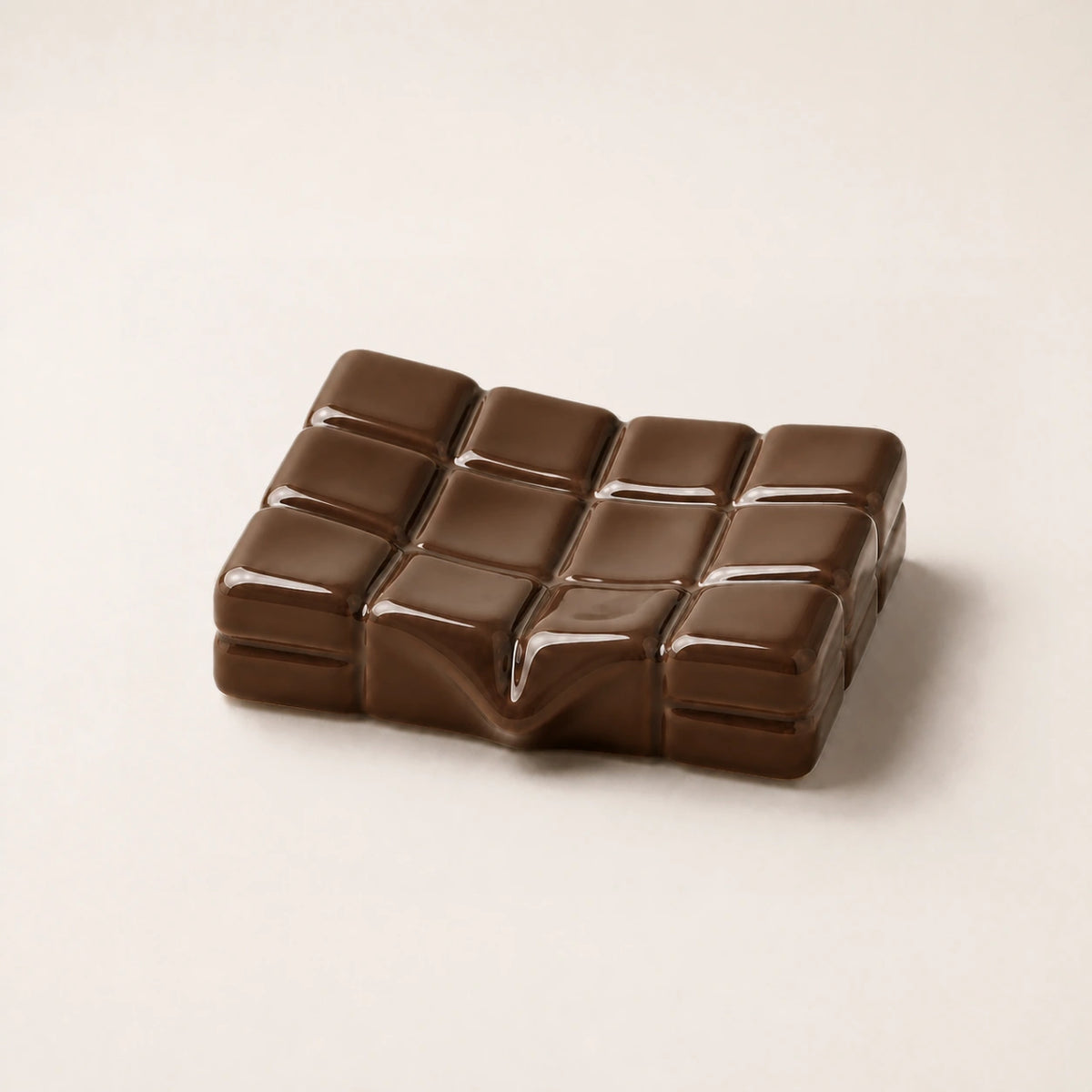 Dark cacao sculptural ceramic soap dish with a shallow twelve-tile basin
